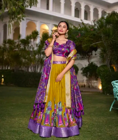 Mustard Color Kalamkari Printed With Zari Weaving Border Dola Silk Lehenga Choli